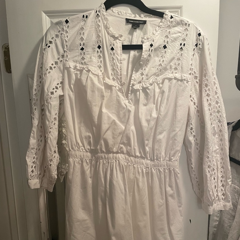 Something Navy Eyelet Sleeve Dress with Ruffle Hem